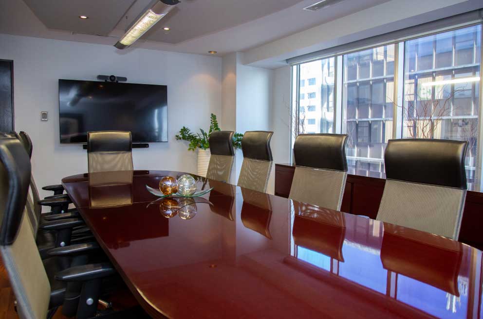 Boardroom from Edge Legal, showing sofisticated chairs and a formal space for legal reunions